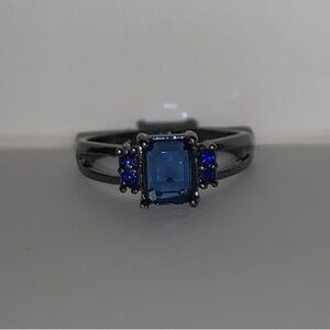 Elegant Blue Gemstone Ring with Gothic Dark Band